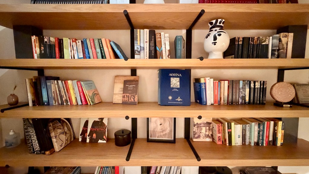 The curated book shelf in Monsieur Didot, Athens